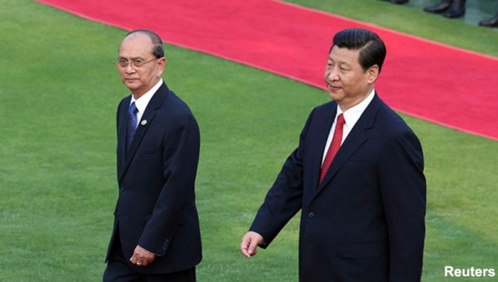 Các nhà lãnh đạo Trung Quốc đã tìm đủ cách để ve vãn Tổng thống Myanmar Thein Sein ủng hộ họ trong vấn đề Biển Đông khi ông sang thăm Bắc Kinh cuối tuần qua, nhưng đã nhận được cái lắc đầu từ chối. Ảnh: Reuters.
