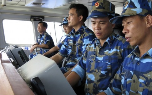 Lực lượng Cảnh sát biển Việt Nam thực hiện nhiệm vụ trong vùng đặc quyền kinh tế, thềm lục địa của Việt Nam những ngày giàn khoan Trung Quốc 981 hạ đặt trái phép. Ảnh: Reuters.