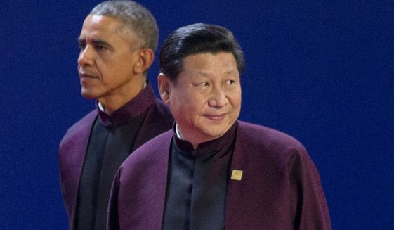 Tổng thống Mỹ Barack Obama và Chủ tịch Trung Quốc Tập Cận Bình tại kỳ họp APEC vừa qua ở Bắc Kinh. Ảnh: Washington Times.