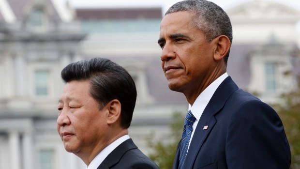 Tổng thống Mỹ Barack Obama và người đồng nhiệm Trung Quốc Tập Cận Bình trong cuộc họp báo chung. Ảnh: Steve Helber/AP.