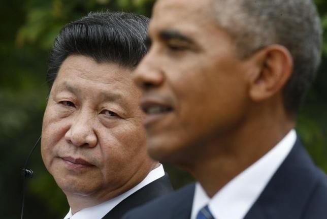 Ông Tập Cận Bình và ông Obama trong cuộc họp báo chung, ảnh: Reuters.