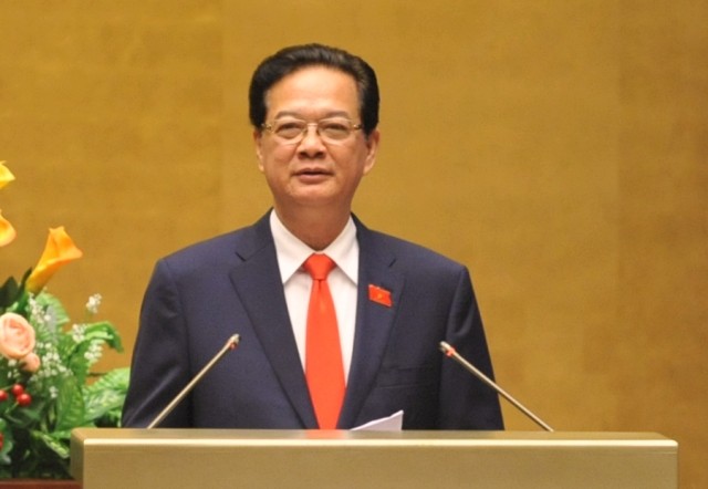 Thủ tướng Chính phủ Nguyễn Tấn Dũng trong phiên trả lời chất vấn trước Quốc hội sáng 18/11, ảnh: Nhật Bắc/VGP.