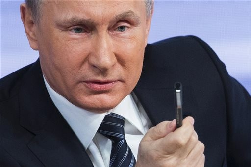 Tổng thống Putin trong cuộc họp báo ngày hôm qua tại Moscow, ảnh: AP.