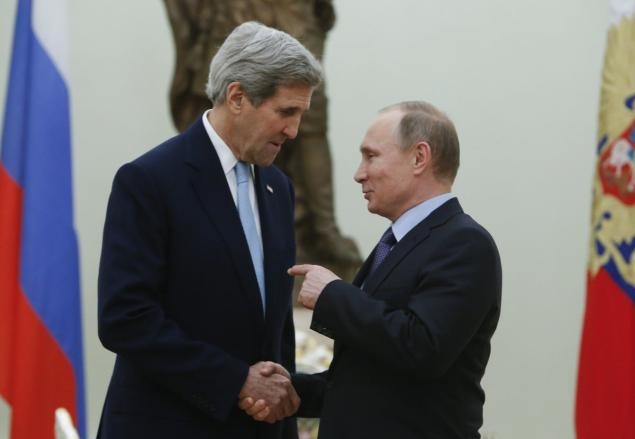 Tổng thống Putin vừa có cuộc tiếp kiến Ngoại trưởng Mỹ John Kerry tại Moscow ngay trước cuộc họp báo thường niên. Ảnh: Nydailynews.