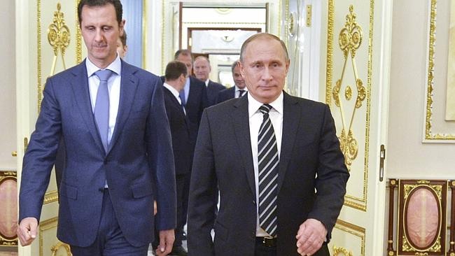 Tổng thống Nga Vladimir Putin và người đồng cấp Syria Bashar al-Assad. Ảnh: awdnews.