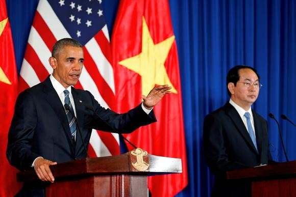 Tổng thống Barack Obama và Chủ tịch nước Trần Đại Quang. Ảnh: Reuters.