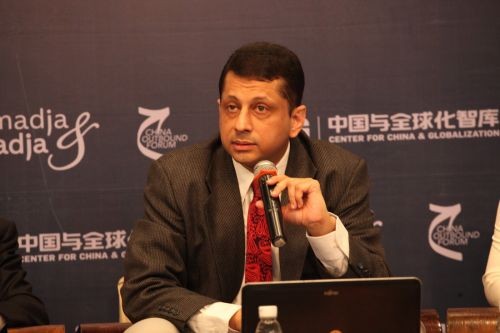 Nhà nghiên cứu Syed Munir Khasru trong một lần tham dự Diễn đàn Doanh nghiệp Trung Quốc với toàn cầu hóa. Ảnh: zgswcn.com.