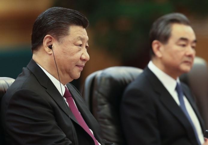 Chủ tịch Trung Quốc Tập Cận Bình và Ngoại trưởng Vương Nghị trong một sự kiện đối ngoại, ảnh: SCMP.