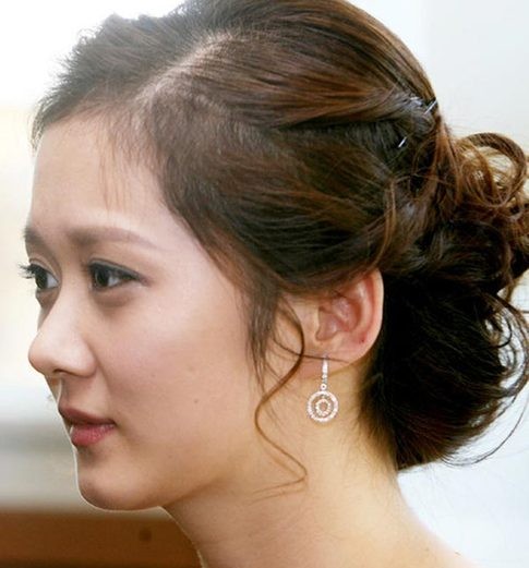 Jang Na Ra trông già hơn tuổi, có lẽ vì mái tóc.