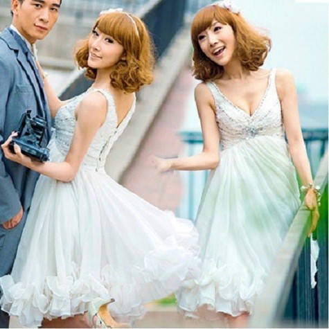 Váy cưới ngắn là lựa chọn ưu tiên của những cô dâu cá tính và hiện đại. (Ảnh: PN today) Xem thêm: Những mẫu váy cưới làm nức lòng cô dâu mùa hạ.