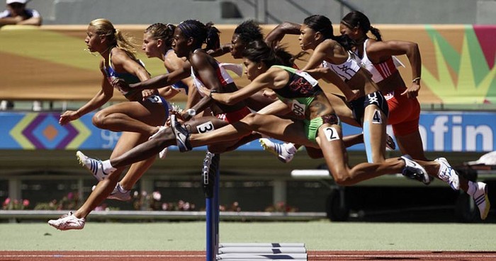 Các VĐV nữ thi đấu ở nội dung 110m vượt rào ở Đại hội thể thao Trung Mỹ
