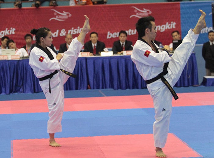 Đình Toàn và Minh Tú mang về tấm HCV đầu tiên cho Đoàn thể thao VN tại SEA Games 26 ở môn Taekwondo nội dung quyền biểu diễn đôi nam nữ.