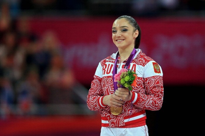 46. Aliya Mustafina – Thể dục dụng cụ: Mustafina đoạt 4 huy chương cho ĐT Thể dục dụng cụ Nga tại Olympic 2012, gồm 1 huy chương Vàng ở nội dung xà thăng bằng, huy chương Bạc nội dung đồng đội và 2 huy chương Đồng ở các bài biểu diễn trên sàn.