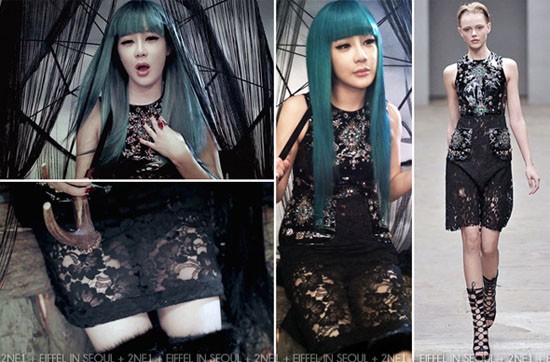 Trong MV mới "It Hurts", cô nàng Park Bom diện đầm đen của Christopher Kane với họa tiết khá cầu kỳ, phần thân là chất liệu da thuộc được đính đá lấp lánh, phần chân váy làm bằng ren.
