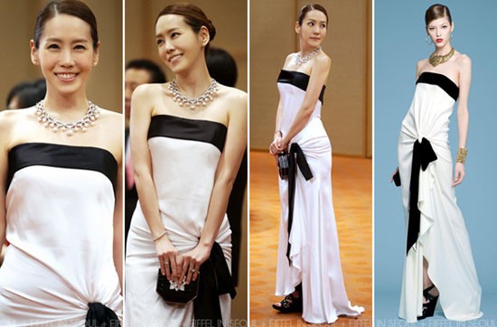 Ngôi sao "Chuyện tình Paris" Kim Jung Eun với hình tượng quý cô giàu có, sang trọng, trong bộ đầm dài trắng với viền và dải thắt đen của Yves Saint Laurent, vòng cổ ngọc trai.