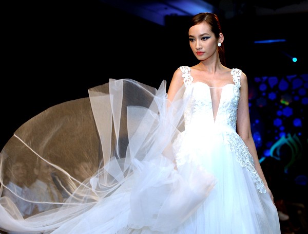 ...sau đó Trương Tri Trúc Diễm lại lọt tiếp vào Top 15 cuộc thi Hoa hậu Quốc tế 2011