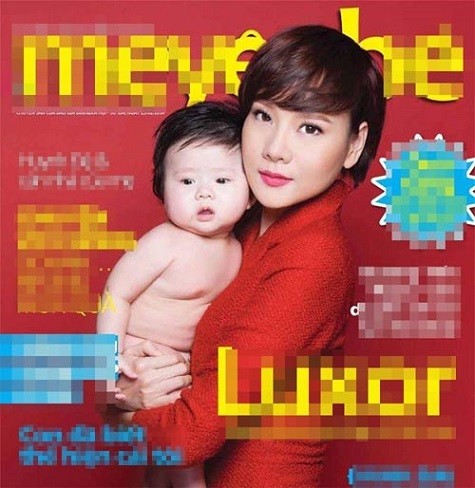 Dương Yến Ngọc và con trai trên bìa một cuốn tạp chí.
