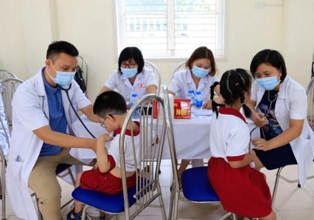 Tỷ lệ học sinh tham gia bảo hiểm y tế tại huyện Thanh Trì đạt 99,9%. (Ảnh: Lê Hà)
