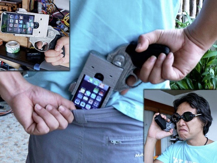 7. Vỏ hình súng lục: Một thành viên của cộng đồng thiết kế 3D đã sáng tạo ra bộ vỏ iPhone độc đáo này. Bạn có thể cầm nắm và mang theo iPhone như đang cầm theo khẩu súng lục.