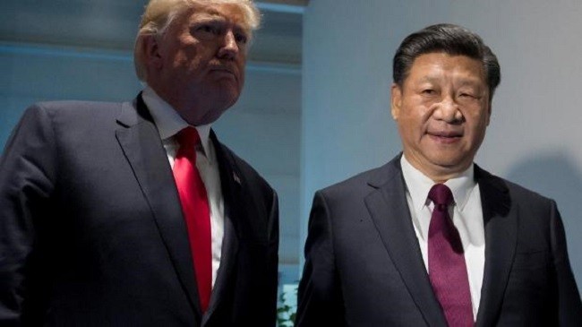 Tổng thống Mỹ Donald Trump và Chủ tịch Trung Quốc Tập Cận Bình cũng có hai tính cách trái ngược (Ảnh: AP).