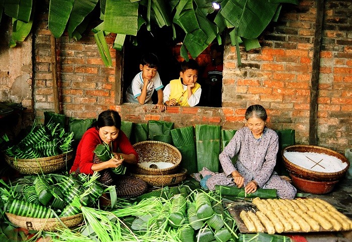 Những chiếc bánh tét, bánh chưng được mọi nhà thực hiện vào mỗi dịp Tết đến xuân về (Ảnh minh họa: vietnamnet.vn).