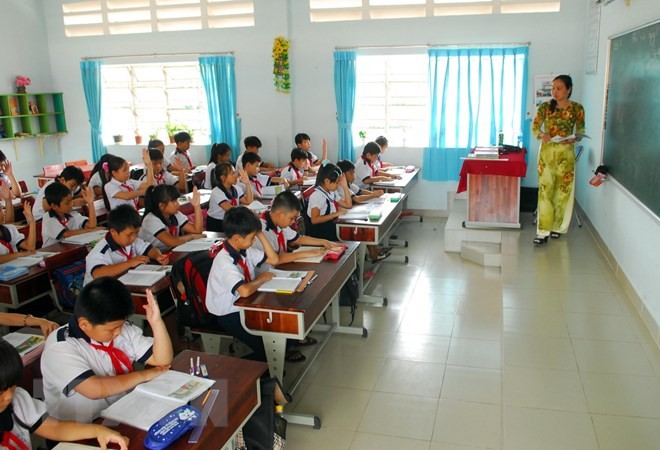 Giáo viên háo hức, phấn khởi về việc tổ chức xét thăng hạng giáo viên (Ảnh minh họa: TTXVN).