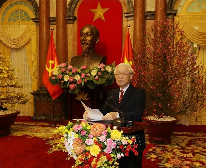 Tổng Bí thư, Chủ tịch nước Nguyễn Phú Trọng chúc Tết các đồng chí lãnh đạo và nguyên lãnh đạo Đảng, Nhà nước, Mặt trận Tổ quốc Việt Nam. Ảnh: Trí Dũng/TTXVN