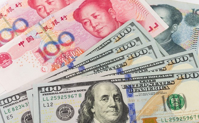Trung Quốc tăng tỉ lệ sử dụng đồng nhân dân tệ được nhận định nhằm thách thức vị trí bá quyền của đồng USD trong hệ thống tài chính toàn cầu (Ảnh:businessinsider.com).