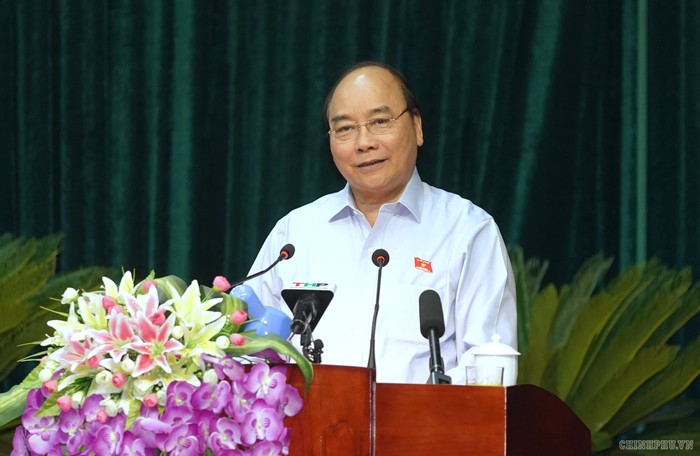 Thủ tướng Nguyễn Xuân Phúc phát biểu tại cuộc tiếp xúc cử tri. Ảnh: VGP/Quang Hiếu.