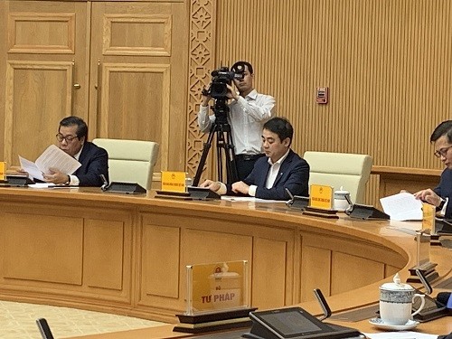 Phó Thống đốc Ngân hàng nhà nước Nguyễn Kim Anh và Chủ tịch Hội đồng quản trị Vietcombank Nghiêm Xuân Thành dự Hội nghị.