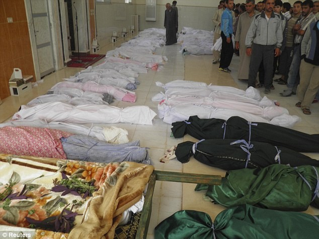 Thi thể của những người bị tàn sát bởi các lực lượng an ninh ở Syria.