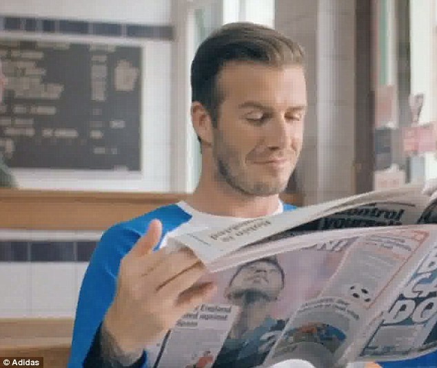 Beckham bảnh bao như quý ngài khi đọc tin về "Beckham mới" ảnh 1