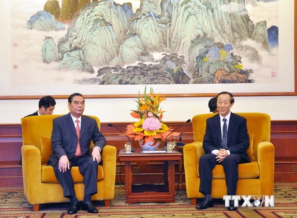 Đặc phái viên Lê Hồng Anh tiếp ông Vương Gia Thụy, Trưởng Ban Liên lạc Đối ngoại Trung ương, Phó Chủ tịch Chính Hiệp Toàn Quốc Trung Quốc. Ảnh: TTXVN.