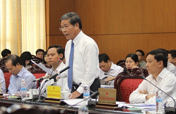 Bộ trưởng Nguyễn Minh Quang trả lời chất vấn tại Ủy ban Thường vụ Quốc hội sáng 29/9. Ảnh: Ngọc Quang.