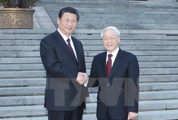 Tổng Bí thư, Chủ tịch nước Trung Quốc Tập Cận Bình đón Tổng Bí thư Nguyễn Phú Trọng. ảnh: TTXVN
