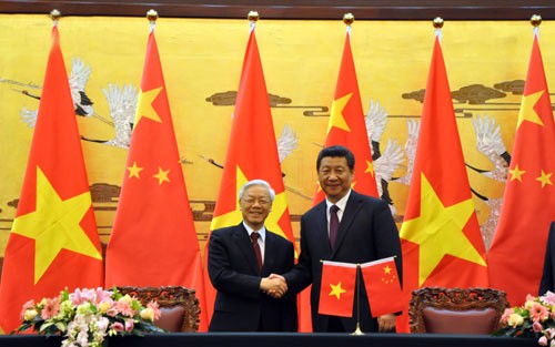 Tổng Bí thư Nguyễn Phú Trọng và Tổng Bí thư - Chủ tịch nước Trung Quốc Tập Cận Bình. ảnh: TTXVN.