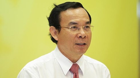 Bộ trưởng Nguyễn Văn Nên cho biết chưa thể trả lời cụ thể vụ việc nhà 8B phố Lê Trực vì còn chờ ý kiến của Thủ tướng. ảnh: VOV.