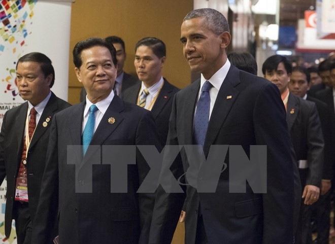 Thủ tướng Nguyễn Tấn Dũng (trái) và Tổng thống Mỹ Barack Obama (phải) tại Hội nghị Cấp cao ASEAN-Mỹ. (Nguồn: AFP/TTXVN).
