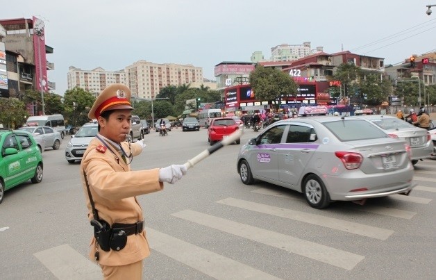 Công an Hà Nội phân luồng giao thông phục vụ Đại hội Đảng toàn quốc lần thứ 12. ảnh: Báo Giao thông.