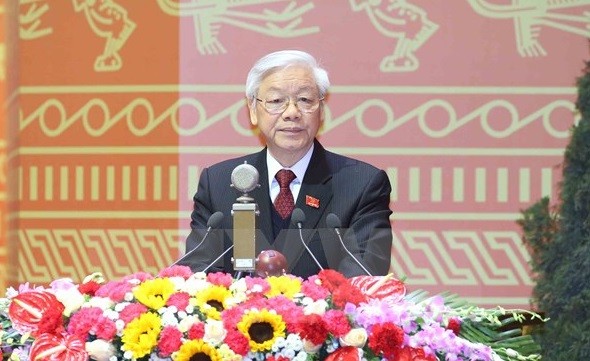 Tổng Bí thư Nguyễn Phú Trọng trình bày Báo cáo của Ban Chấp hành Trung ương Đảng khóa XI về các văn kiện Đại hội XII của Đảng. ảnh: TTXVN.