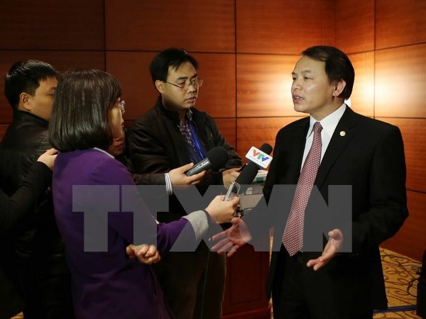Ông Lê Quang Vĩnh - Phó Chánh Văn phòng Trung ương Đảng trao đổi với báo chí chiều 24/1. ảnh: TTXVN.