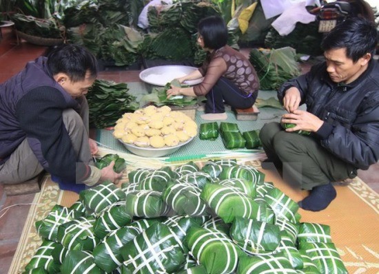 Nhiều người Việt Nam đang sinh sống và làm ăn tại Lào. ảnh: TTXVN.