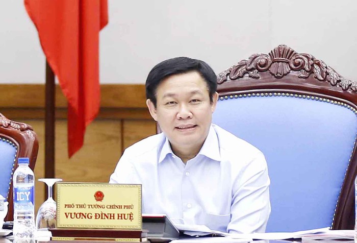Phó Thủ tướng Vương Đình Huệ chủ trì buổi làm việc với các bộ, ngành nhằm tháo gỡ khó khăn vướng mắc cho hoạt động bảo lãnh tín dụng cho các DNNVV. Ảnh: VGP.