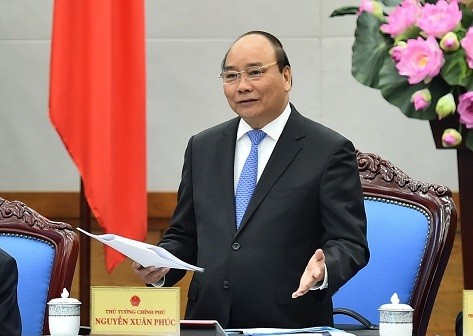 Thủ tướng Nguyễn Xuân Phúc yêu cầu không báo cáo nhiều về thành tích, mà cần tập trung vào các khó khăn, nêu giải pháp tháo gỡ. ảnh: VGP.