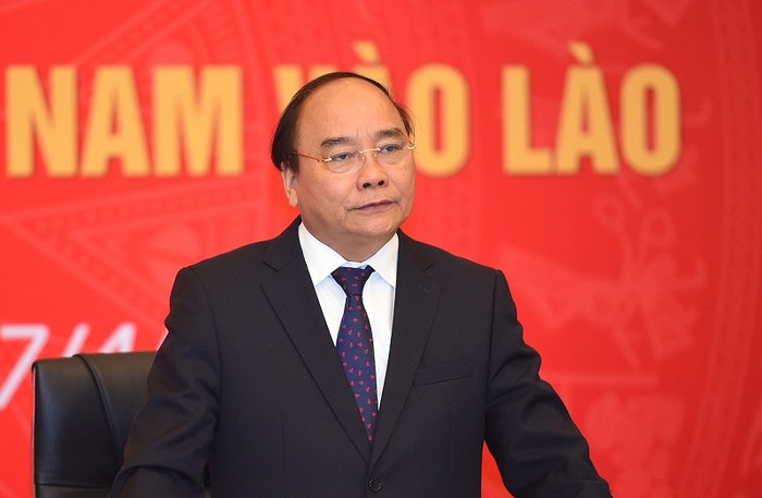 Thủ tướng Nguyễn Xuân Phúc đánh giá cao những nỗ lực vượt khó của doanh nghiệp Việt Nam tại Lào. ảnh: VGP.