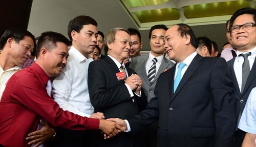 Thủ tướng Nguyễn Xuân Phúc luôn quan tâm tới sự phát triển của các doanh nghiệp. ảnh: TTXVN.