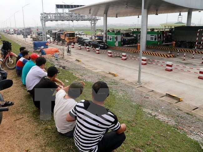 Trạm thu phí BOT Tam Nông (Phú Thọ) cũng đã từng bị người dân phản đối vị trí đặt trạm gây khó khăn cho đời sống của người dân ở khu vực này. ảnh: TTXVN.