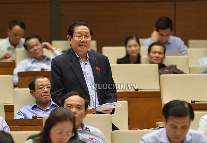 Bộ trưởng Lê Vĩnh Tân phát biểu tại Quốc hội. ảnh: quochoi.vn