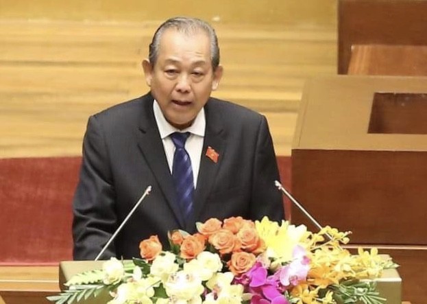 Phó Thủ tướng Thường trực Trương Hòa Bình báo cáo tại Quốc hội sáng 20/5. ảnh: VGP.