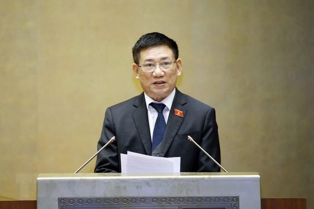 Bộ trưởng Bộ Tài chính Hồ Đức Phớc trình bày Báo cáo về kế hoạch tài chính quốc gia, kế hoạch vay, trả nợ công 5 năm giai đoạn 2021-2025. (Ảnh: Doãn Tấn/TTXVN)